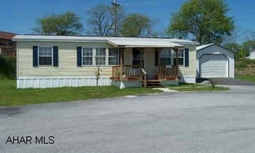 Beautiful, like new Champion 2001 doublewide - 3 Br. 2 BA - 1-car detached garage/very private back yd.  Better Hurry!!!!  Rental lot/ 170 mo. includes trash removal