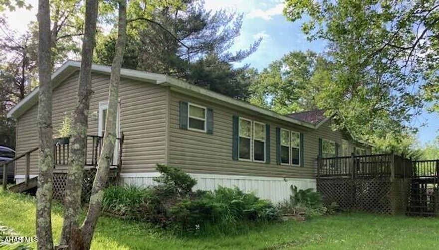 Spacious doublewide with wood burning fireplace in living room, large kitchen/dining area. Master suite with garden tub, walk in closet, 2 other bedrooms and main bath.   Separate laundry area.  Very nice condition. Must be moved.