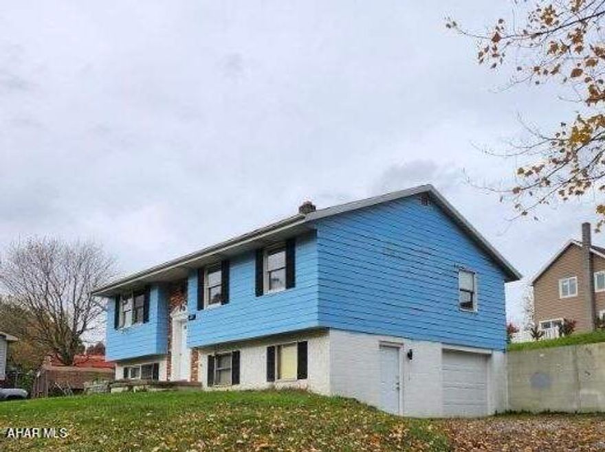 Call to see this three bedroom split entry home situated on a nice lot and low traffic street. This property has off street parking and a nice size integral garage. The lower level offers an additional room that could be used as a home office or a den/playroom. All appliances are included with the purchase. Bring your ideas on how you can make this house your new home. The first floor has an open floor plan with the dining area leading out to a deck that would be great for entertaining. Many possibilities with this one. Call to schedule a tour.