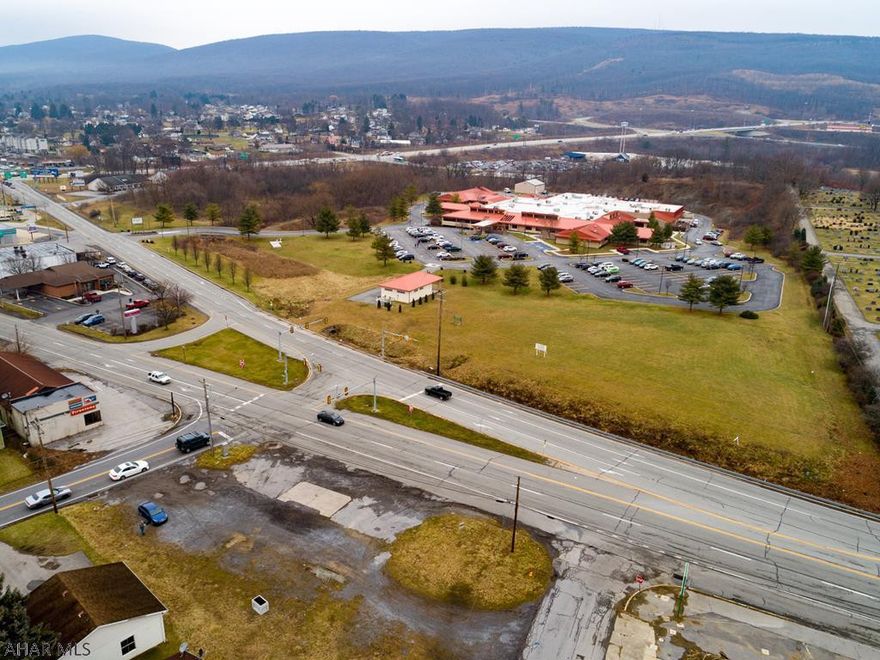High visibility commercial lot zoned highway business. Ask listing agent for list of approved zoning uses. 
New survey on file.
Motivated seller, bring offers.