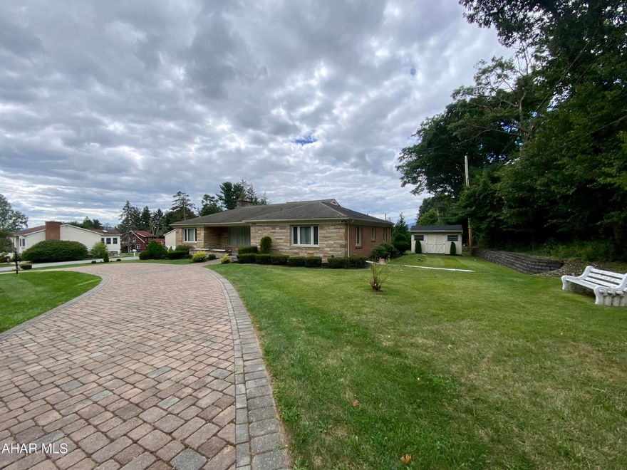 NEW PRICE! Located on a corner lot in Sylvan Hills this 3 bedroom 2 bathroom ranch home is waiting for you.  The first floor features an open floor plan with natural light and large spaces.  The rear yard is fenced with access from the garage.  The basement has endless potential.  Schedule a showing before it's too late!
