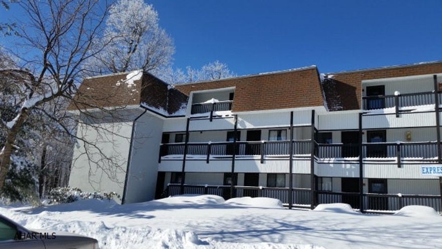 Great 1st floor condo! Fully furnished with 2 bedrooms, 2 baths, covered deck. Amenities include: indoor and outdoor pools,hot tub, tennis courts, exterior maintenance, snow plowing, and trash removal. Dues $265.00/month.  #J-261