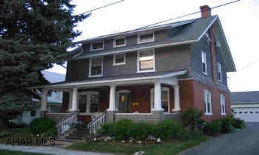 Home of distinciton with Premiere design. Traditional style white pillared brick/cedar shake shingle. Oak flooring, oak woodwork and columns. Large back porch overlooks landscaped lawn, white picket fence. Full house water filtration system.