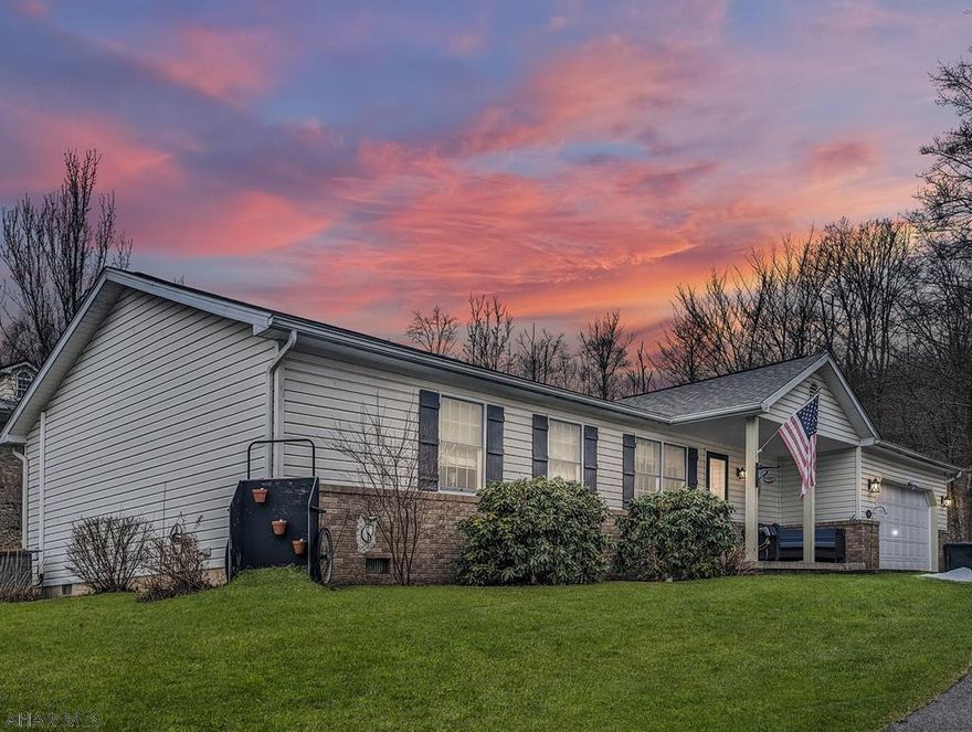 Single floor living at it's finest! Immaculate ranch style home on a private lot, beautifully maintained and updated. Vaulted ceilings in dining area, kitchen and living room. Kitchen has all new appliances and a pass through to the living room. New paint and carpet throughout. New gas fireplace in living room which features a large window to let light in and French doors to the private screened in back porch. It's the perfect place to grill out, entertain or just relax and listen to the nearby mountain stream. Back inside, there are two spacious bedrooms with walk in closets. Both fit king sized beds. The Master Bedroom also has a master bath with tub, shower and double sinks. Laundry is off the dining area. There is also a two car garage and a large shed. New roof too!