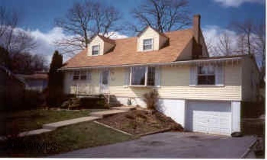 Lovely modified cape cod nestled on a large, partially wooded, lot on a dead end street. Great find in the city!  Totally remodeled 4 bedroom with main level family room and 1 car garage.Under ground utilities.