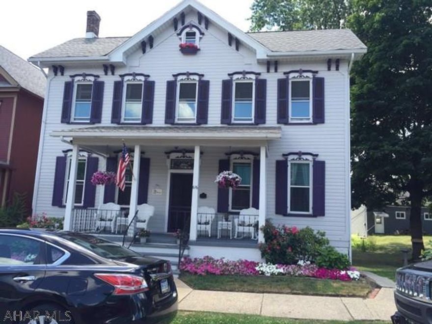 Beautiful home offers 3 bedrooms & 2 baths. Home is updated but the old charm still remains. Beautiful wood floors, ceramic in the kitchen, carpet in the bedrooms. New windows, fresh paint, newer kitchen. Absolutely stunning home. Large attic storage. Formal Dining room is set up as a bedroom at this time, wardrobe is covering butlers staircase.