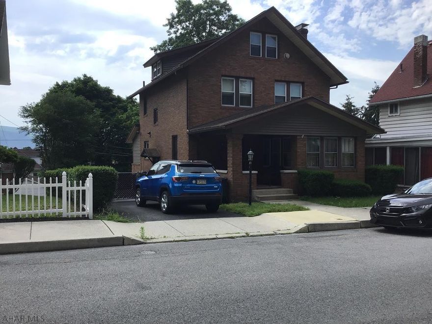 Classic 2 story all brick  on 50 X 120 lot.  3 bedrooms, 2 full baths, with incredible gourmet kitchen, et-in.  Open architecture.  Off street parking w/rear deck & patio overlooking spacious backyard.