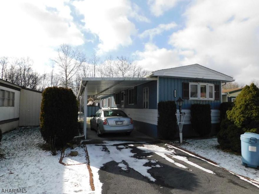 Cozy one story home located in 55+ community.  This home features 2 spacious bedrooms with tons of natural light.  Eat in kitchen with open view to Dining Room and Living Room.  Laundry is conveniently located outside the master bedroom.  Lot rent includes trash and snow removal.  This home is a 1980 14x70 Marlett and features two storage sheds.