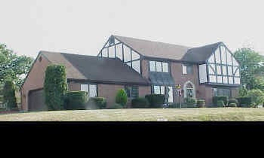 Beautiful 2 story tudor in mint condition - New kitchen includes appliances - 2 first floor family rooms - Hot tub - Finished basement with game room - 2 full baths - 2 half baths.  Two fenced level lots in Brentwood (100x134).