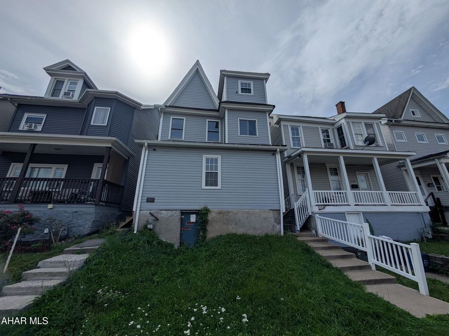 Altoona 2.5 story vinyl home is perfect for investors or handypersons. Large living room, formal dining, eat-in kitchen. First floor laundry and half bath (no sink) plus  finished attic and over-sized detached garage with workshop. Third bedroom is small with no closet.  AS-IS sale. Seller will make no repairs