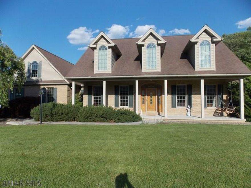 WOW! Stunning views from this custom built home on a gorgeous 2 acre lot. This ranch home offers a huge master suite with jetted tub and a sit down shower. The 2 guest rooms are joined by a Jack and Jill bath. Lots of windows offer sunshine and views from every direction. If you need a garage for your RV or you collect cars, this is the home for you.  The detached garage has plenty of room for the RV and several more cars. Upstairs offers plenty of storage or could be finished as a man cave. This wonderful home offers so much more with plenty of room to expand.  The basement is huge and can be finished plus there is tons of space in the yard for an in ground pool. Be sure to schedule a showing, sit down and enjoy the view.  2017 Taxes estimated. Lawn currently being treated by TruGreen.