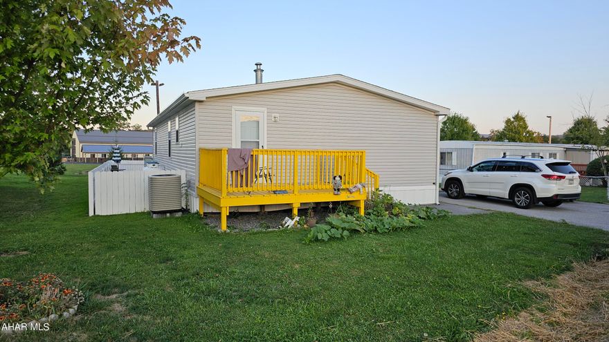 This wont last! 2020 Doublewide with a garage and attached mudroom. Fenced yard in the beautiful Wollowbrook community. 3 bedrooms 2 baths and large rooms. Island in the eat in kitchen adjacent to a large living room.