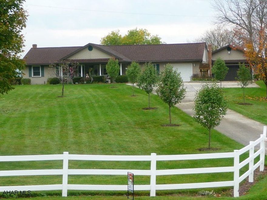 Beautiful well maintained Rancher, 3BR/2BA fenced 3.616 Acres, concrete drive, Attached 1 Car Garage, Attached 2 Car Garage with workshop.  Home has newer cherry kitchen with skylights, island, pantry, appliances included, new remodeled bath with jacuzzi tub and ceramic tile, large dining room with woodburner stone accent wall and new carpet, big family room with skylights and stone accent wall,.  New oil tank, 200 amp electric, newer hot water furnace 3 Zones, heat pump central ac, new well pump and pressure tank, new septic tank Oct 2010.  Nicely Lancscaped with a good variety of trees and shrubs, fencing on 3 sides of property.  The home has a large covered front porch great for sitting.  Home next to elk farm with great views dont miss this one it will go fast.