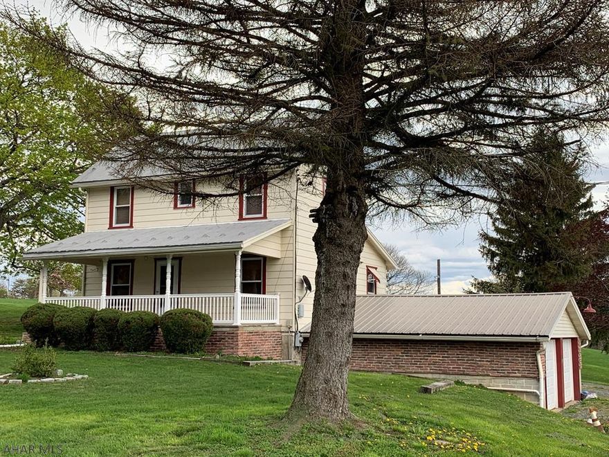 Nicely remodeled country home on 1 acre with panoramic views!    Freshly painted, new carpeting, ceramic tile flooring in the kitchen and bath room, and a walk up attic for additional storage.  2 car garage, barn and storage shed!  Enjoy and Relax on the large front and back covered porches while taking on the breath taking views of the country!  This farmette is perfect if you enjoy the country!  With in minutes of Shawnee State Park, Blue Knob Ski Resort and The Omni Bedford Springs Resort.