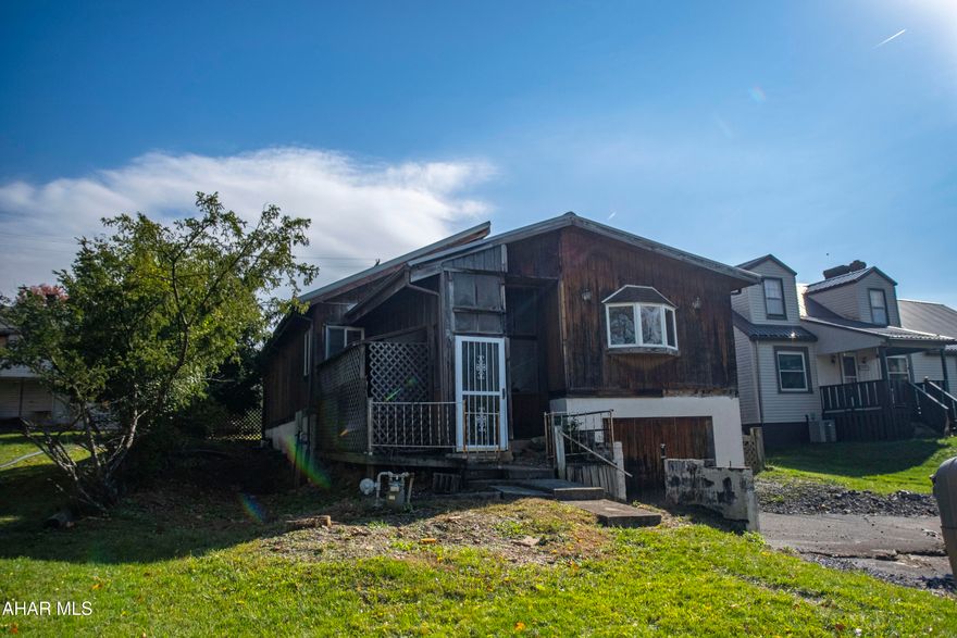 Welcome to easy, one-story living in a fantastic location close to all local amenities! This 2-bedroom, 1-bath home is located in the desirable Hollidaysburg School District and offers both comfort and convenience. The house has handicap accessibility, making it a great fit for all ages and needs. Enjoy the convenience of two garages—a 2-car detached garage with an indoor ramp leading directly to the side door, plus an attached 1-car garage for everyday use. The home offers a comfortable, easy-to-maintain layout with plenty of natural light throughout. The unfinished basement provides potential for storage or future finishing. The backyard has a shed with plenty of storage. If you're looking for a home in a convenient location with thoughtful accessibility features and ample garage space, this is the one!