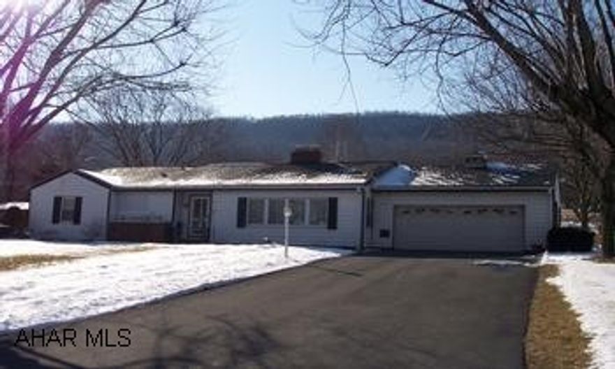 3 bedroom ranch ranch style home with new kitchen,  new appliances. central air, central vacuum system, brick fireplace with pellet stove insert, newer roof, newer windows, new insulation, new shed one a level lot close to town.