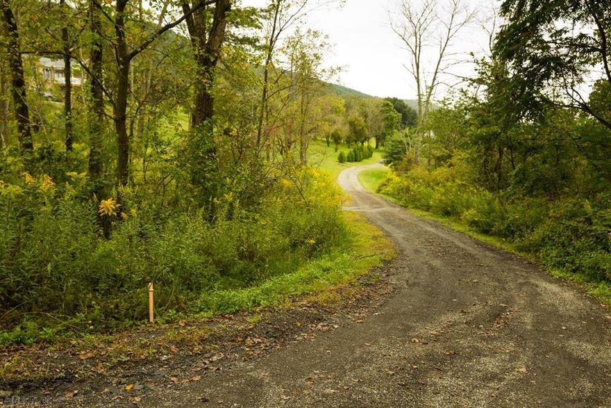 A lovely 12.6 acre parcel at the bottom of Royer mountain is waiting for you to make it your new home or favorite hunting camp destination.  The property has electric and an approved septic.  As an added bonus the property comes with a 1999 Jayco 5th wheel camper in great condition.  On the property is a 16"x30' pole barn that has concrete floors and a 10' overhang.  Perfect for enjoying the breathtaking views.  Additionally there is a storage shed.  Between the camper, shed, and pole barn, you've got all of your storage and recreation needs met.  With a septic system already installed, all that is needed is for you to build your dream home.  Part of the parcel borders state game lands and the property is less than 10 miles from Hollidaysburg.