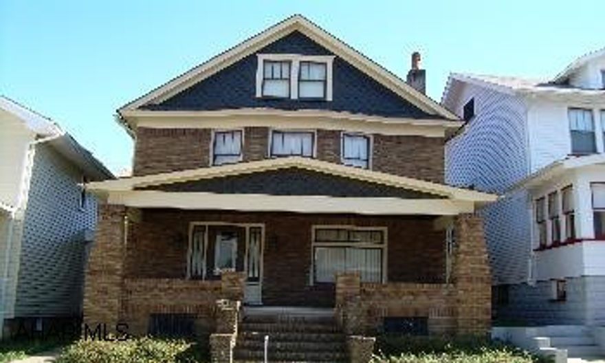 Very nicely maintained 3 story brick home w/ detached brick 2 car garage.  Master bedroom w/ his and her closets, possible 4 other bedrooms with a bonus room.  3rd floor heated.