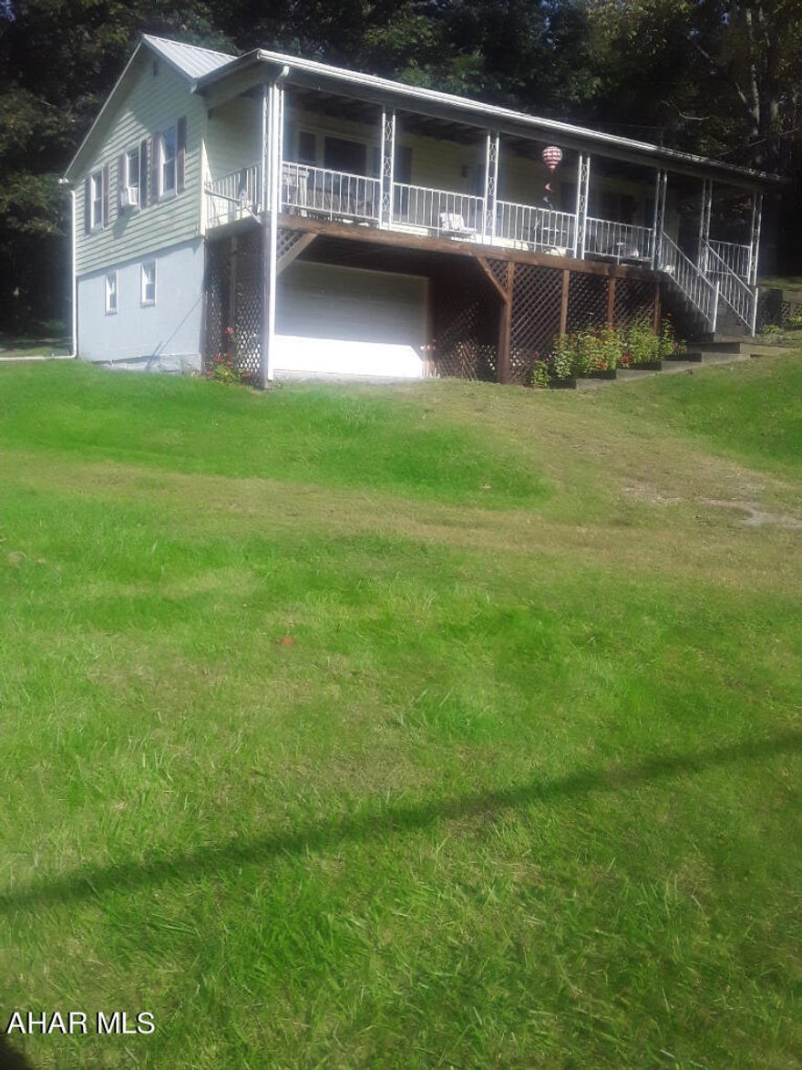 Cozy 3 Bedroom 1 Bath Home on 3/4 Basement on 2 acres of land, conveniently located Close to State Game lands and only 20 minutes to Raystown Lake. Home offers New Heater, Garage Door
, Garage Door Opener, Flooring, Doors and windows. Property also consists of Metal Roof with Gutter Guards, Free standing Gas Fireplace, Large Living Room with Eat in Kitchen and 3 12x24 Out buildings.
Beautiful views of the Mountians and is convenient to Local  Stores