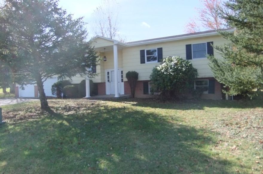 Hollidaysburg Loop area bi-level home on .78 acre with many upgrades including updated eat-in kitchen with stainless steel appliances, new baths, new carpeting and flooring throughout, fresh paint, 2 car attached garage, finished basement, screened porch and large lot in quiet Hollidaysburg area.  Property Sold “AS-IS”