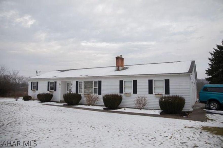 One owner ranch home with 11 acres and a pond. Enjoy the view from the screened in porch. Corner property, newer septic improvements, side entry garage. Close to Shawnee State Park, Bedford.