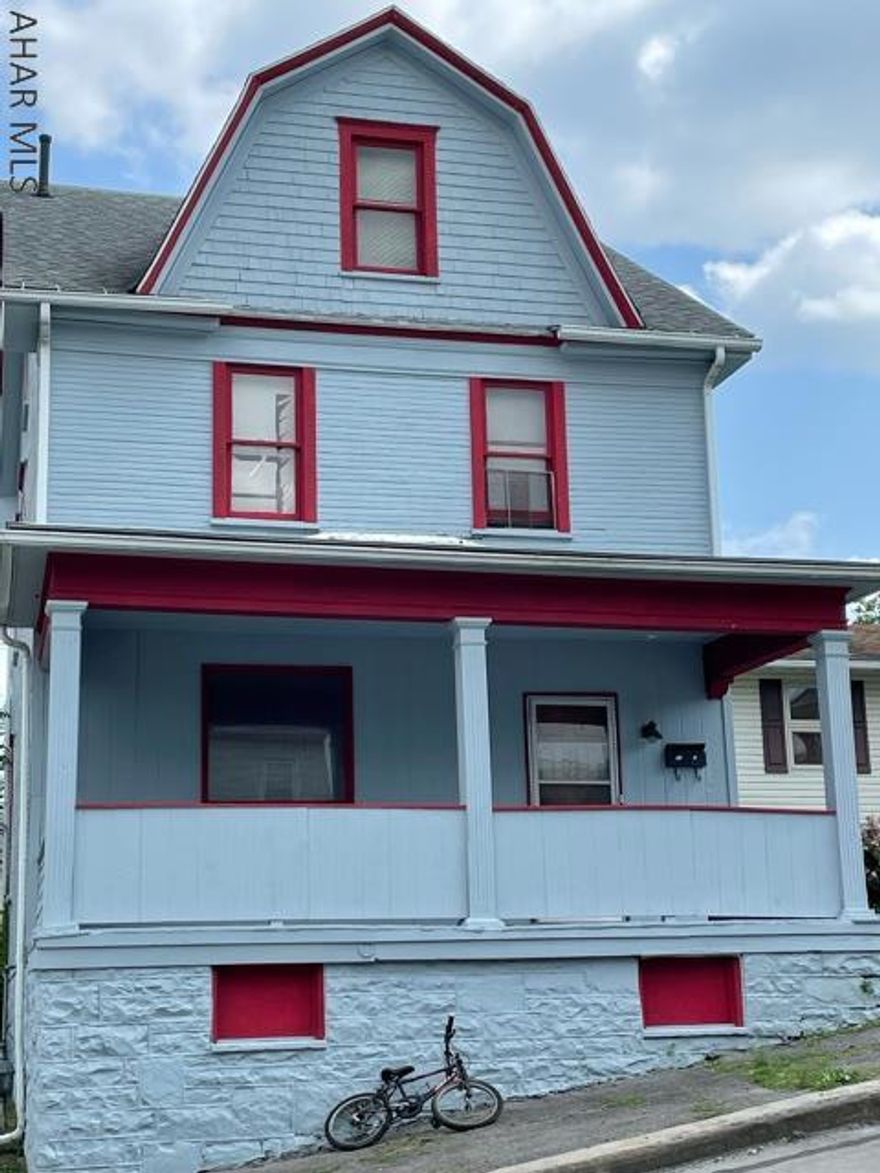 2 bedroom, 1 bath house with a large covered front porch and off-street parking. Located next to a park and basketball court. Hardwood flooring on 1st floor. 2nd floor laundry. Attic bonus room could become 3rd bedroom.