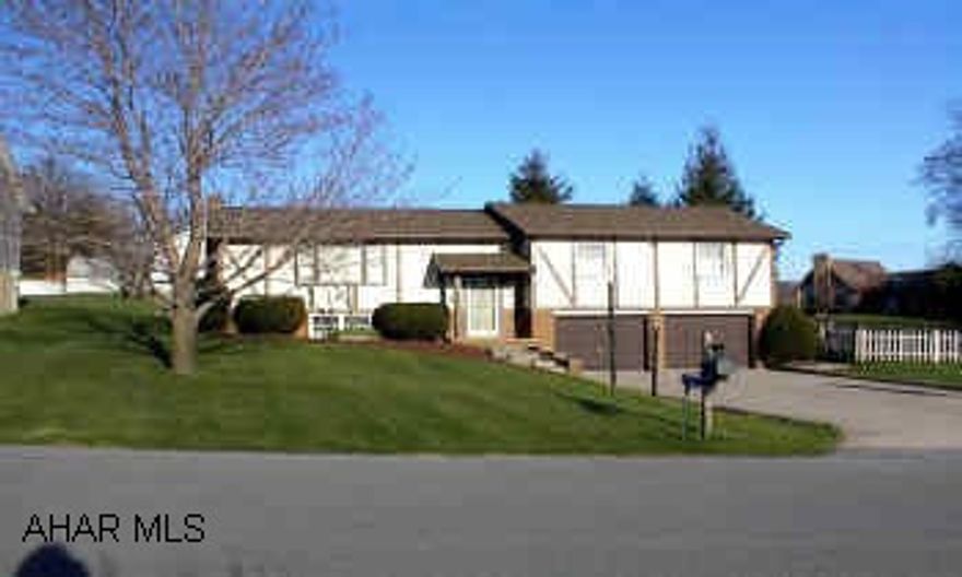 beautiful corner lot fenced. new roof, new berber & pergo floors. MB suite has dressing room, cedar closets, & whirlpool tub. Family room has fireplace . Huge deck