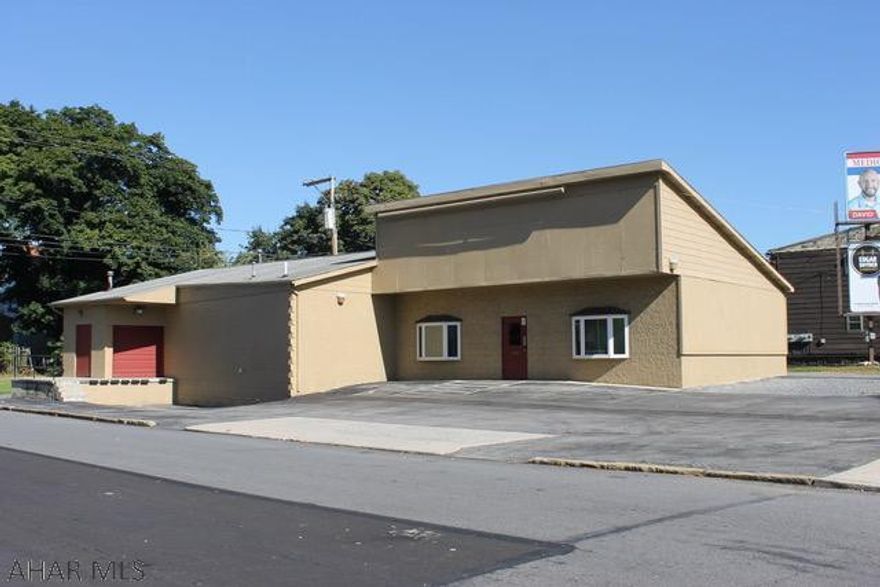 Great business opportunity in this highly visible, very large commercial space.  Showroom size approx 45'x27'.  Additional space approx 36'x19' which leads to the loading dock to make large deliveries easy.  There are three office spaces each measuring approx 7'x9', a utility area, 2-1/2 bathrooms and 8+ parking spaces.  Don't let your chance of your business in this easily accessible property get away!!  Call to schedule your easy to show appointment today, property is being sold "AS IS".