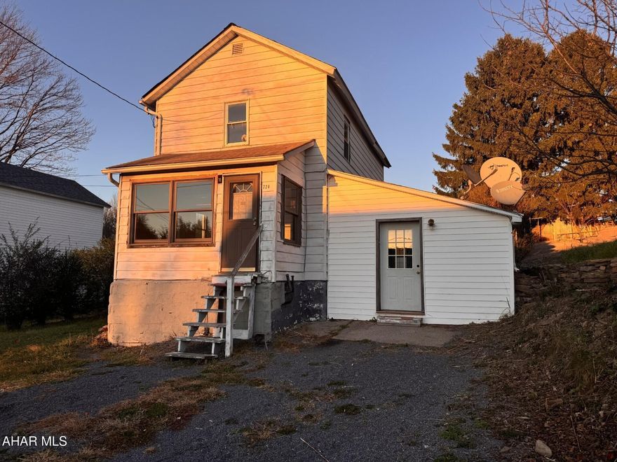 2 story alum & vinyl sided home.  2 bedroom with possible 3rd bedroom/family room on first floor.  2 baths with one on each floor.  Oil FHA heat.  Great potential to live in or rent out!
