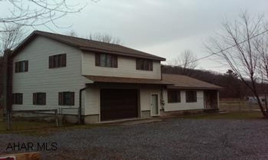 Very nice home on 1 +/- acre lot completely fenced. Pavilion with above ground pool.