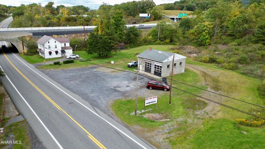 4 bedroom, 2 bath home with detached 28'x30' oversized garage resting on 1.69 acres located just outside of Breezewood with easy access to I-70, PA Turn Pike, and Route 30. This is a good opportunity for an investor or someone looking to open an auto repair shop with good visibility and ample parking.