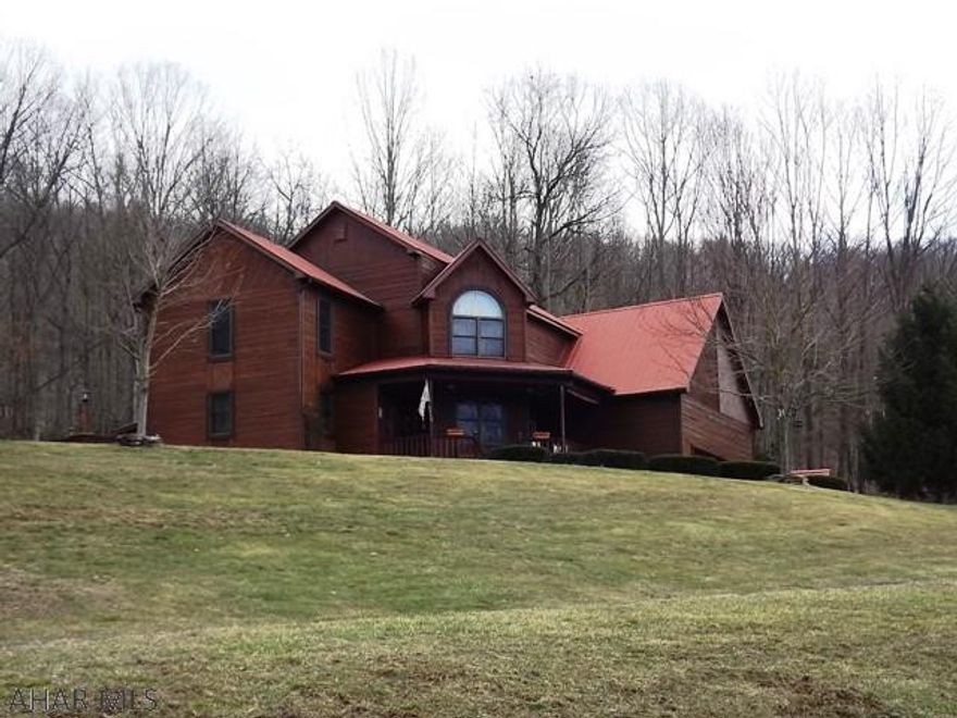 MOTIVATED SELLERS..the owners are unexpectedly being transferred and must leave their Dream Home! This stunning hillside contemporary on 7+ acres flows perfectly between the indoor and outdoor living areas! Beautiful hardwood flooring, spectacular kitchen w/granite, ceramic flooring, oak cabinets, breakfast bar, additional eat-in area plus a formal dining room! All fresh paint, whole house water filtration system, central air and attic fan, stamped concrete patios, fenced yard, 16' ceilings in garage, 2'x6' construction, shed w/electric. Large master suite with spacious bath, oversized w-I closet and bonus room!  You'll love the architectural nuances throughout. Views of the mountains, Juniata River..complete serenity here! Close to Rails to Trails and Raystown Lake.  Truly a Gem!