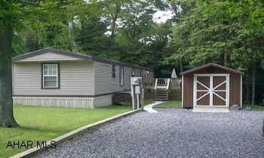 Totally Remodeled 3 BR, 1.5 Bath with New Kitchen Flooring, Deck, & Shed on 1/3 acre Lot.  Assoc. dues include: trash, pool, snow removal