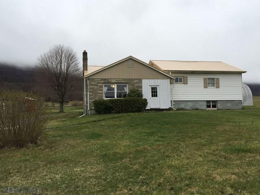 Nice home in the country but within minutes of downtown Bedford. Situated on 2.26 acres with small pond and wildlife. Plenty of room to expand. The partially finished family room has a wood/coal stove. 2 car carport, 40x32 Quonset Building holds up too 6 vehicles,12x16 Eshes shed, 18x20 wood shed, and 8x10 Garden shed.