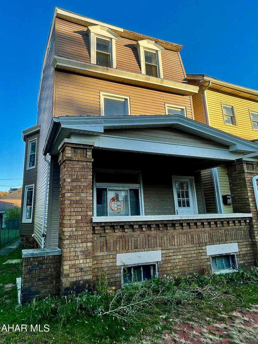 Handyman special! This house is spacious and with the three floors there is nothing but potential bring a vision for the place and make it your own today!