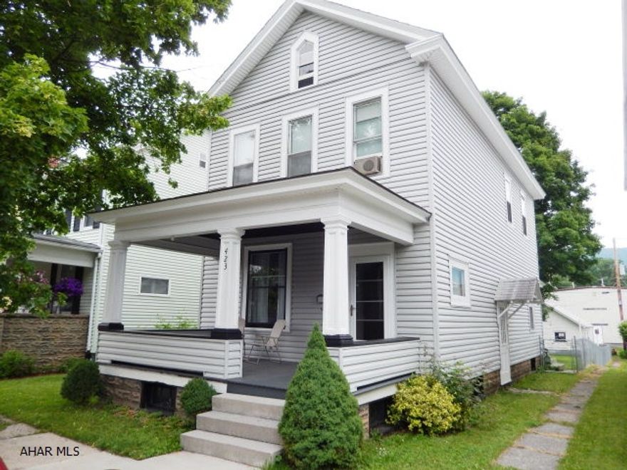 3 blocks from Bellwood Schools, fenced yard, 2 car garage, spacious rooms, laundry on 1st floor, priced to sell!  Covered front & rear porches.
