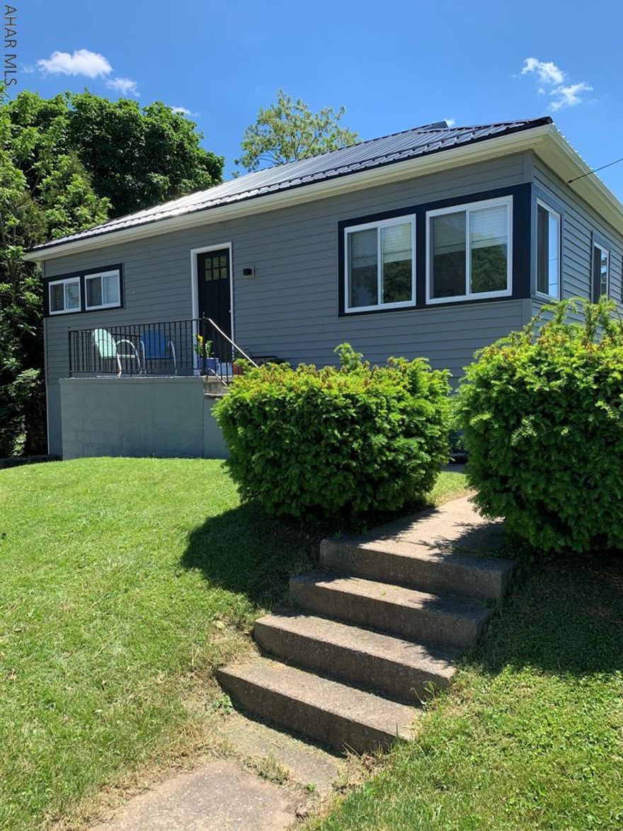 Make your new address 103 Barclay Street!  Move in ready home with lots of updates! This home features great living areas including the living room and dining room, 2 bedroom's and 1 full bathroom.  New deck in the back with an awesome fenced in yard. One car integral garage. New metal roof, new windows, new siding just to mention a few new items on this lovely property! Walking distance to downtown Bedford.  Just minutes away from PA Turnpike.  Come check out what this beautiful home has to offer in Bedford today!  A MUST SEE!!!!