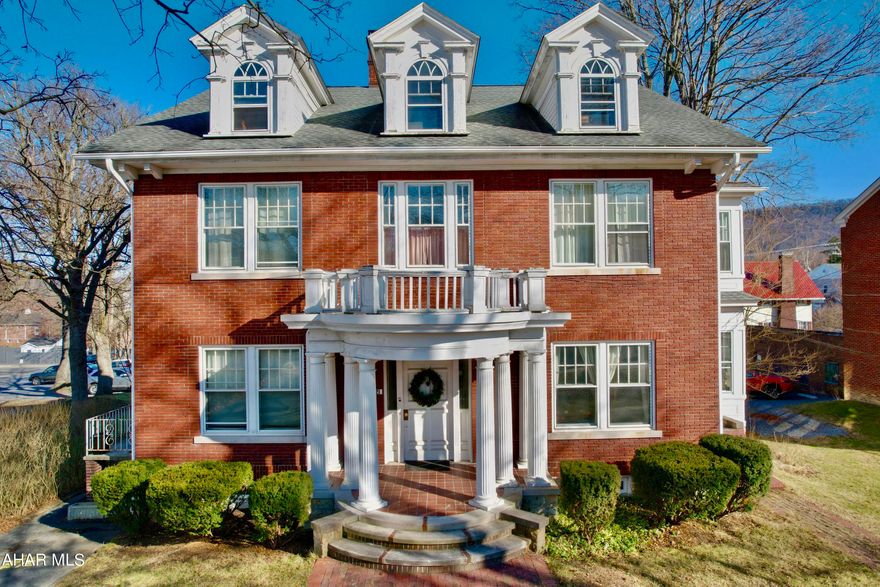 Beautiful brick colonial home in downtown Bedford.  This elegant home boasts high ceilings, ornate architecture, original glass French doors, transom windows, stained glass windows, grand fireplaces, foyer, tile work, stonework, large kitchen and more.  Site back and enjoy the architecture of the roaring 1920's.  The large lot with perennial gardens, garden pond, carriage house, and patio bring beauty and serenity to the back yard.  Restore this home to a single family residence or continue as a multi-unit home.  Have the best with both options, live in this elegant home and rent out the 3 additional units.  Comes with a large garage with additional off street parking.  In historic downtown Bedford, minutes away from Historic Bedford Springs, Shawnee State Park, Blue Knob State Park, Rocky Gap State Park and Casino.  Close to I99, Pa turnpike, I70, I68. 2 hours away from Washington DC, Pittsburgh and Baltimore.