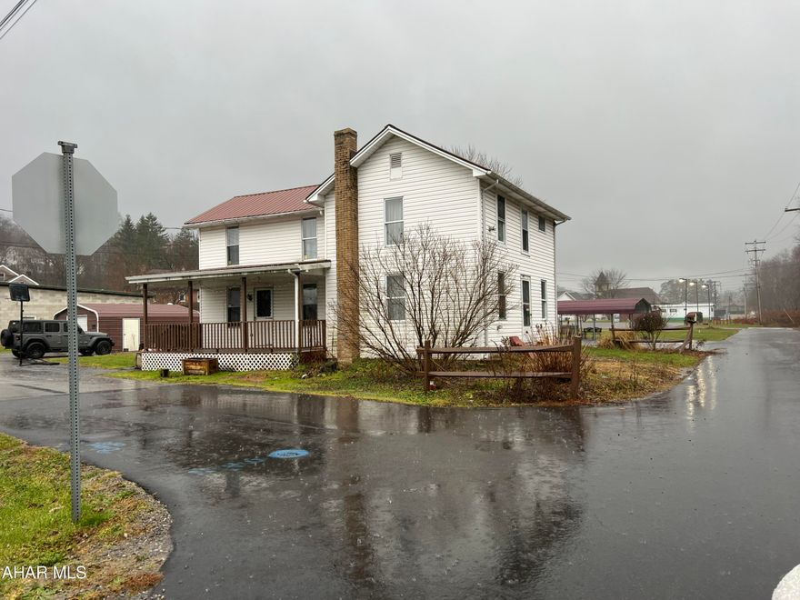 Nicely remodeled two story home on a level corner lot. This home features 3 bedrooms, 2 baths, kitchen with beautiful oak cabinets, Living room and den or added 1st floor bedroom.  Covered porch. 100 amp breakers and oil fa furnace. Partial basement. Detached on car garage. Move in ready!