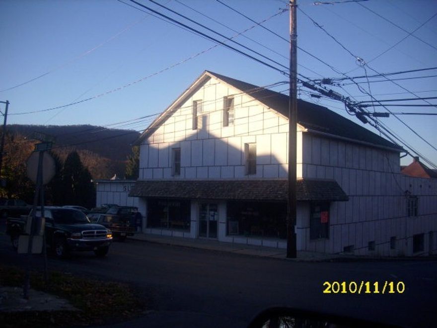 Large retail building on the corner in Everett. 200 amp electric service, 2 loading docks. Loads of possibilities.