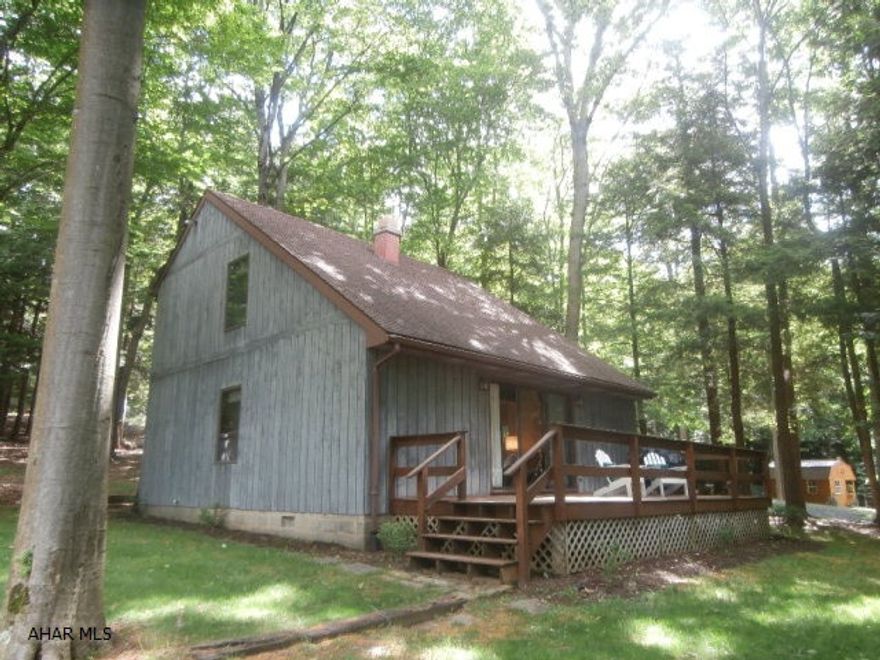 Quality constructed cedar sided 1.5 story. Vaulted ceiling, 1.5 baths, 3 brs with one on first floor, balcony, wood burner. Beautiful home or second home. One owner since new - well cared for and maintained.