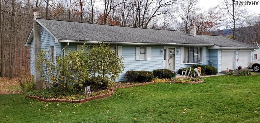 Bellwood-Antis School District 3 bedroom 1.75 bath ranch home on 2.1 acres.  Two car attached garage with 24x24 workshop underneath. Full basement partially finished with fireplace. Spacious eat-in kitchen with walk out sliding doors to 14x24 deck.  Very well maintained home.