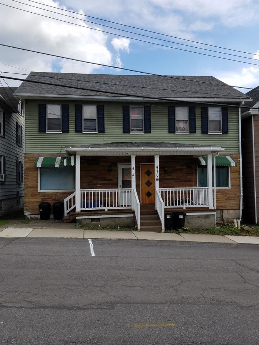 Two story duplex, new roof, laundry hookups in basement.