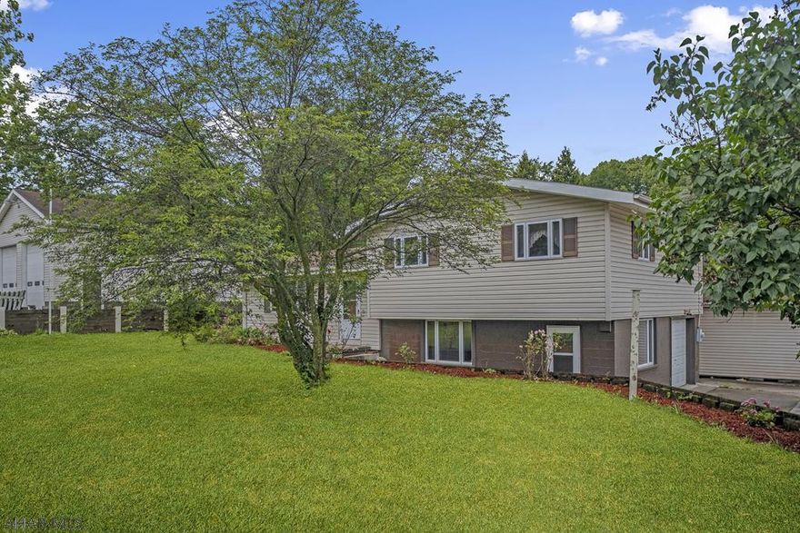 Split-level 3 bedroom home with large 30x40 detached garage on a corner lot in Logan Township. Bonus room and half bath in walkout basement. Check out our 3D virtual tour.