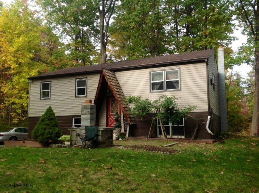 Cute 3BR 1BA house was just resided with vinyl. The kitchen and living room are wide open. Finished basement has a wood/coal stovethat keeps the house nice and toasty warm! Private yard with lots of trees and an above ground pool completes the package. Taxes are $932 with homestead, and $1066.42 without homestead.