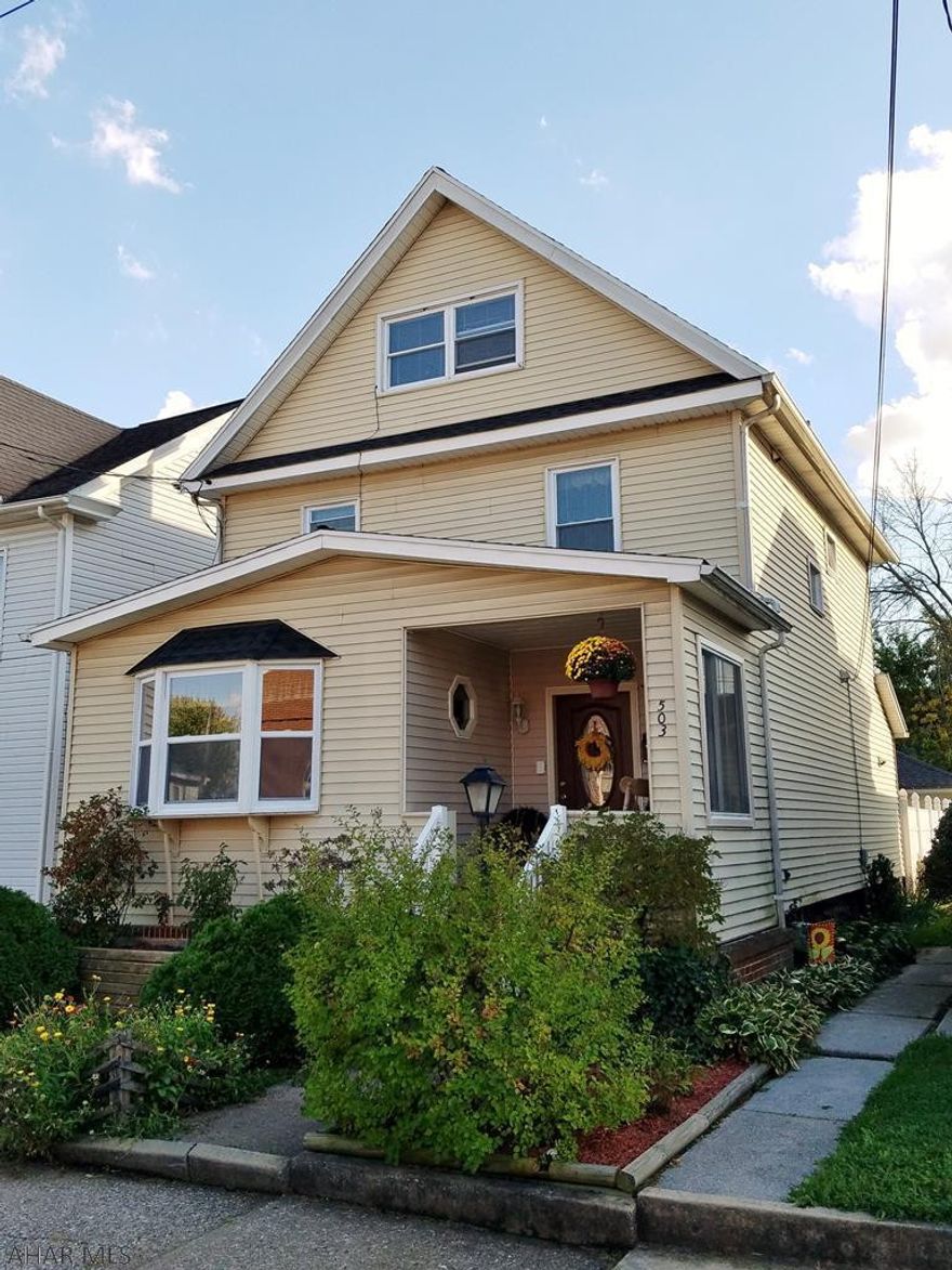 This lovingly maintained home is picture perfect!  Truly move in ready.  Relax on the front porch or enjoy the secluded environment of the fenced in backyard.  This home features a detached building for storage or workshop activities (no longer a garage).  Off-street parking. The entire home has been updated with new plumbing, roof, wiring, windows, flooring and ceramic bathroom surrounds and showers.  Don't let this one get away, schedule a showing today!