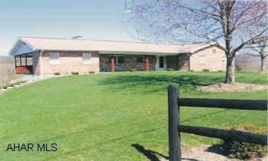 Brick/Vinyl Ranch home on an acre with view. Convenient to schools and shopping.  Home Warranty included.