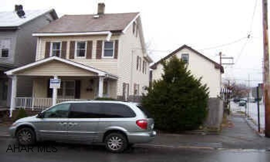 Nice 2 story home on a corner lot. Great starter home. Sold "as is" see listing agent for addendum.