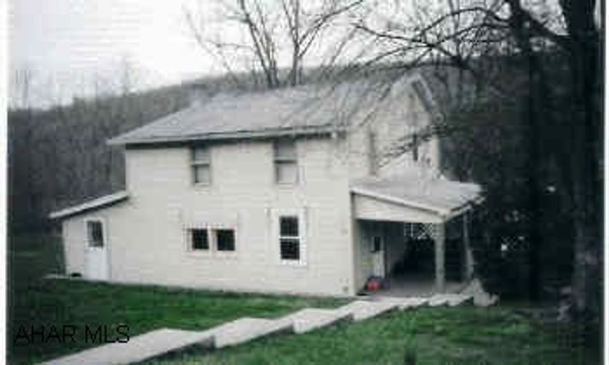 Starter home for the growing family or ideal for the avid hunter, short drive to State Game Lands. Located in Defiance.  Large fenced yard, double lot.