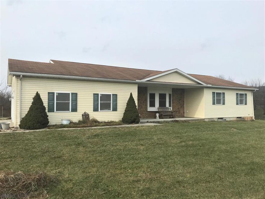 This ranch home was built in 2003 and is situated on 1.49 acres in Cove Park Acres.  It offers a living room with picture window, kitchen with oak cabinets, dining area with french doors, den/office, laundry/mud room, master bedroom with tray ceiling and recessed lights, master bath, two additional bedrooms and a full bath.  Open floor plan with living room exposed to kitchen and dining area. Basement that could be finished for additional living area, two-car attached garage and a front porch.  Oil forced air heat, central air-conditioning, and 200-ampere electric. If you're looking for a home to build some sweat equity, this is it.  With a few updates this could be a really nice home. Large yard, nice setting and close to all amenities.